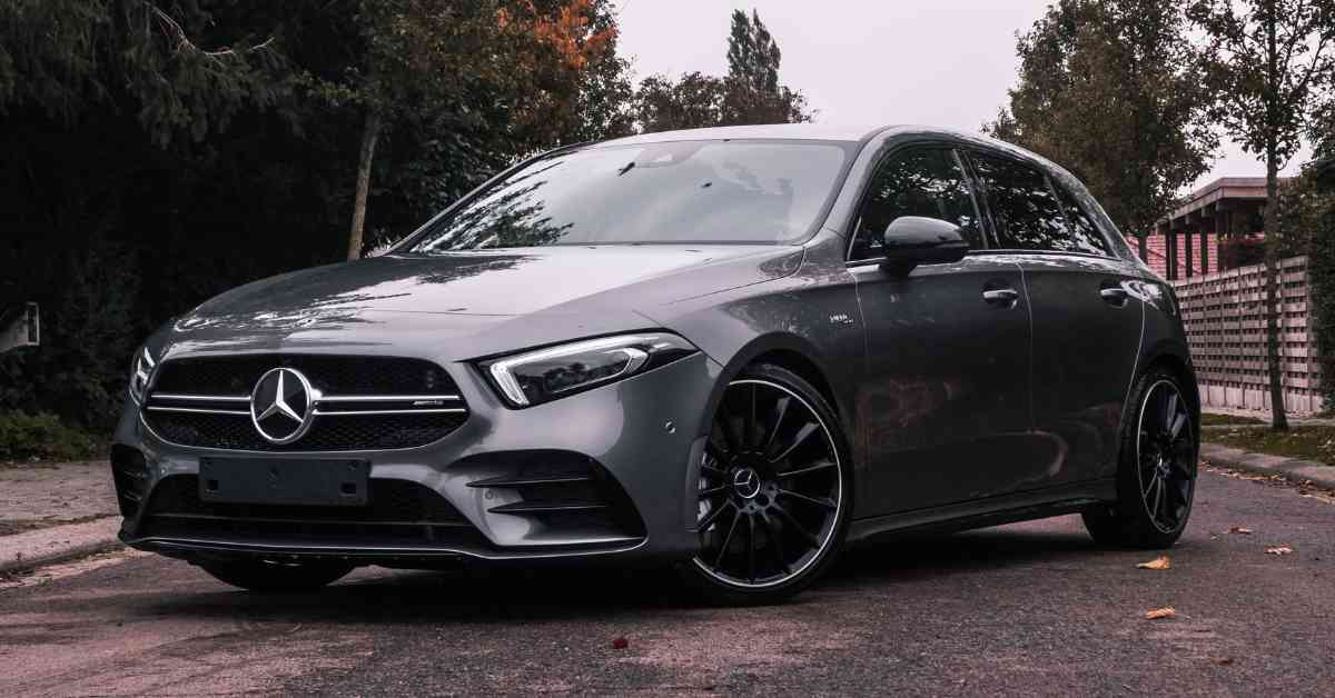 Photo of a Gray Mercedes Benz on the Road