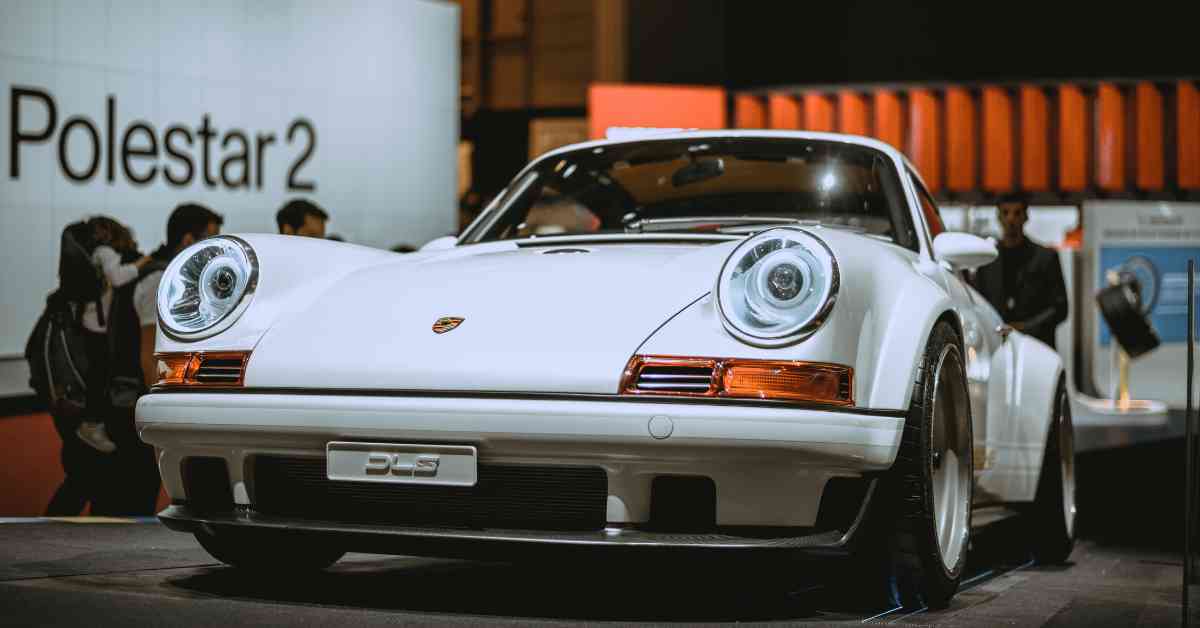 White Porsche 911 Coupe In A Car Show