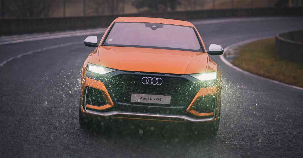 Orange and Black Car Audi RS Q8 on road